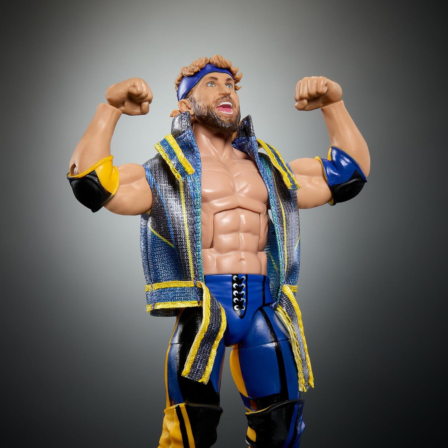 WWE Elite Collection Top Picks Action Figure & Accessories Set, Logan Paul 6-Inch Collectible with Swappable Hands, Ring Gear & 25 Articulation Points