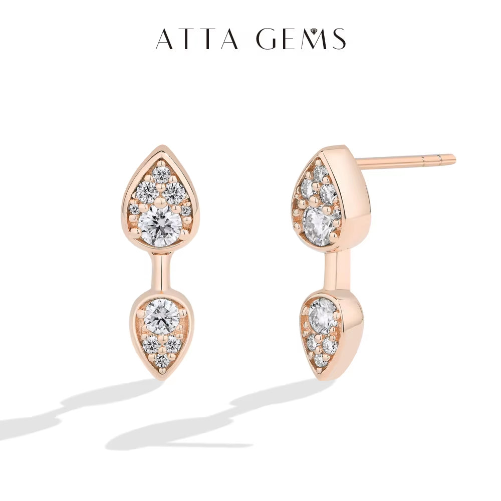 Side view of double teardrop stud earrings highlighting moissanite sparkle and gold plating