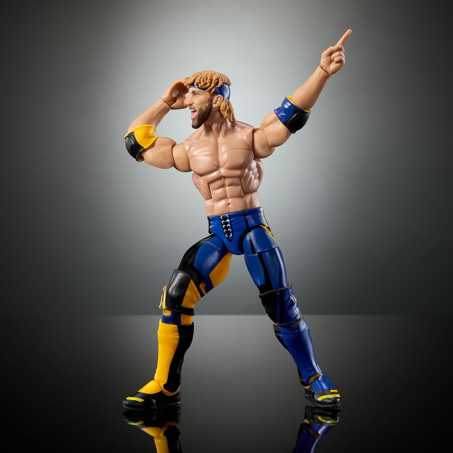 WWE Elite Collection Top Picks Action Figure & Accessories Set, Logan Paul 6-Inch Collectible with Swappable Hands, Ring Gear & 25 Articulation Points