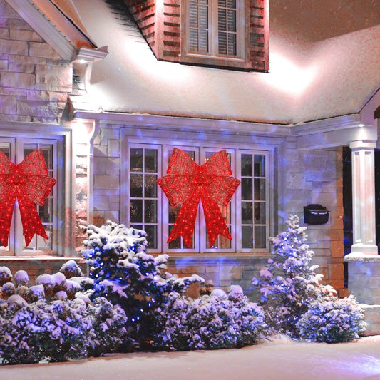 Christmas bow for door with glowing red LED lights and festive holiday design