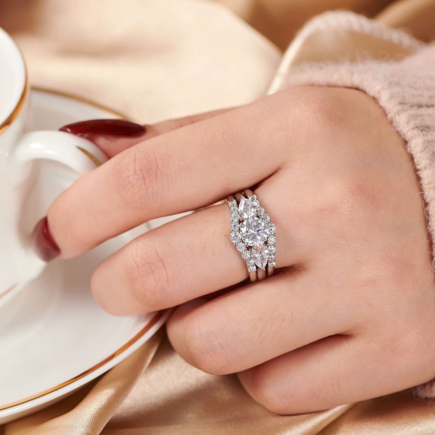 Elegant pear shaped engagement ring set with cubic zircon stones.